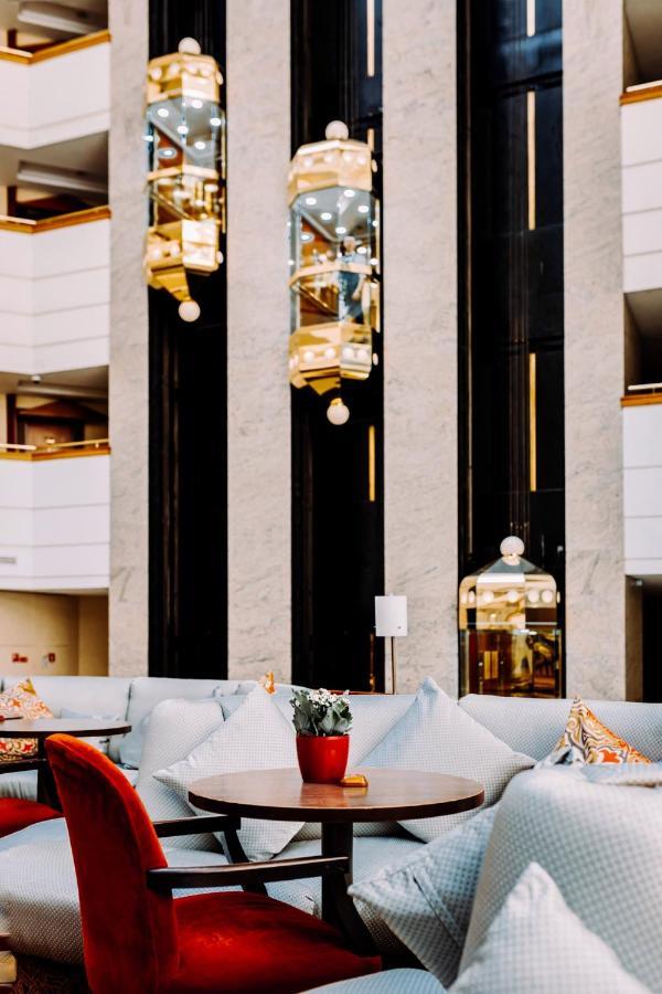 Rahat Palace Hotel Almaty Exterior foto The interior of the hotel