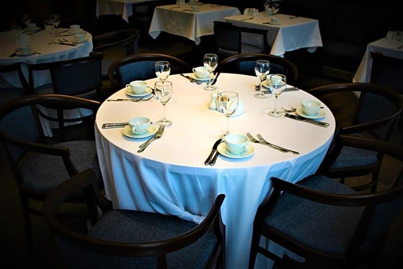 Rahat Palace Hotel Almaty Exterior foto A table set for a meal