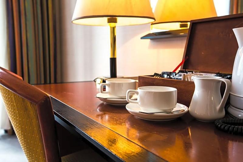 Rahat Palace Hotel Almaty Exterior foto A tea tray in a hotel room